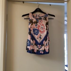 Free people  top sides cut out with bows